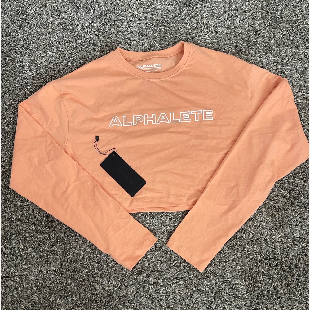 ALPHALETE outlined, long-sleeve crop top!
